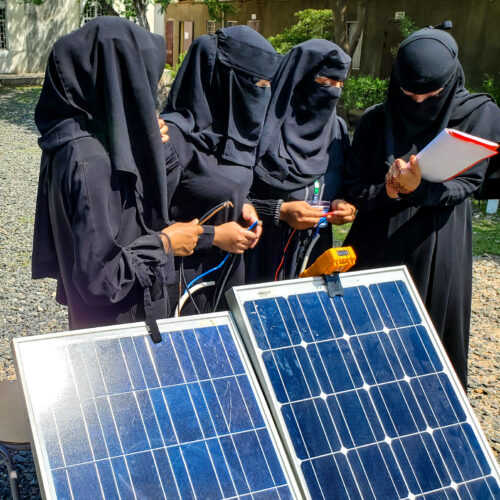 Women working with Solar
